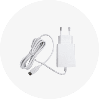 White charger with cable on a light gray background