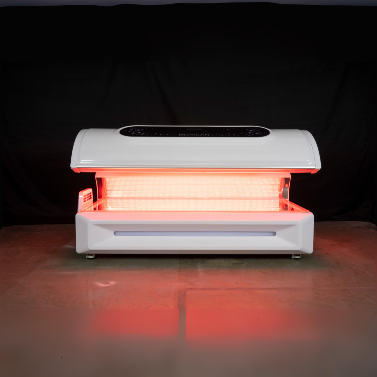 Red light therapy bed with open canopy for full-body treatment