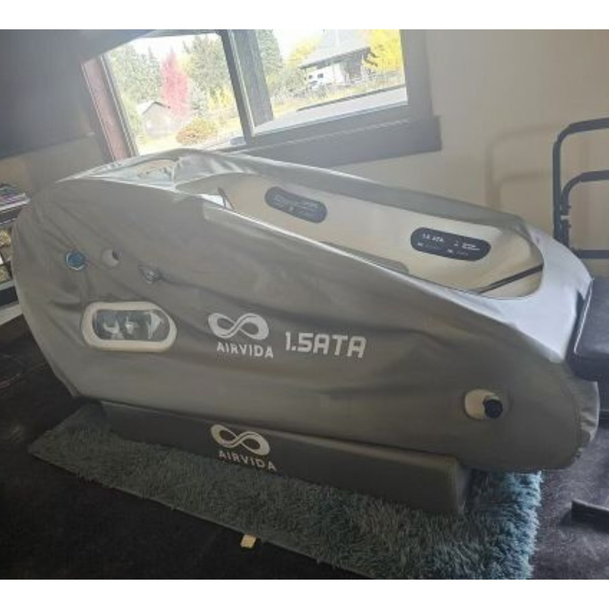 Airvida 1.5 ATA soft hyperbaric chamber in a home recovery setting