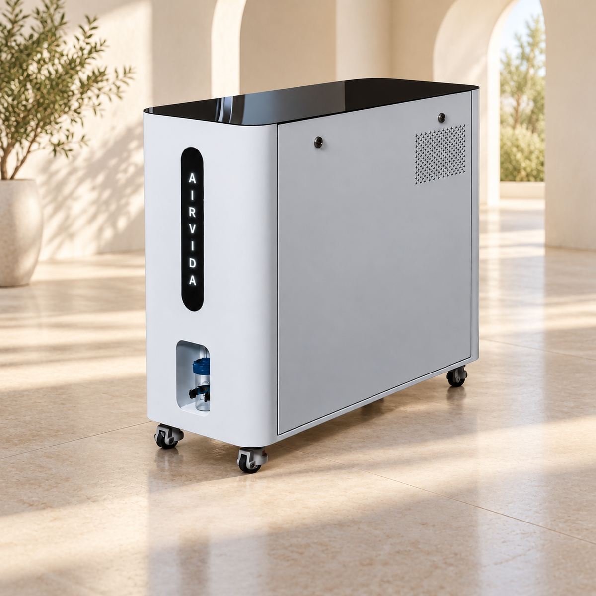 White Airvida oxygen system with black top, ventilation panel and wheeled base, displayed in a bright, luxury wellness space with warm natural light and arches.