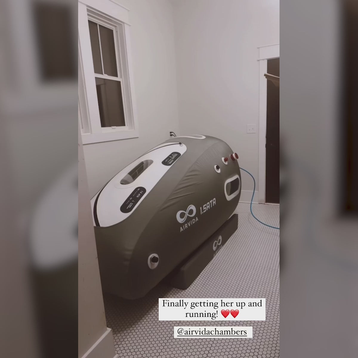 Airvida 1.5 ATA soft hyperbaric chamber set up in a home wellness space
