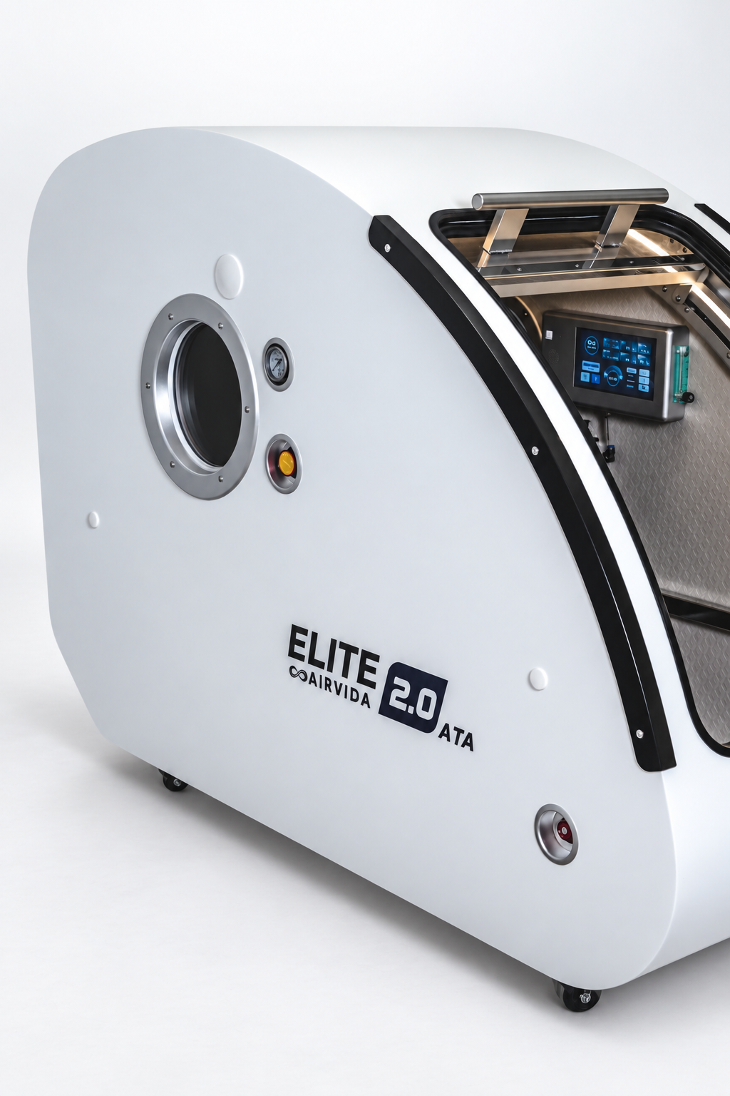 White Airvida Elite 2.0 ATA hyperbaric chamber side view with round access port, pressure gauge, touchscreen controls and curved clear door on white background.